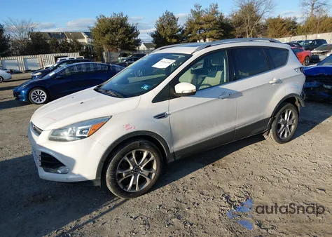 2016 Ford Escape Titanium z USA, uszkodzony, nr VIN 1FMCU9J90GUC72520